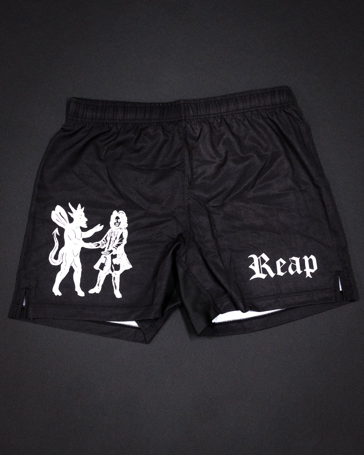 Meeting with the Devil Jiu Jitsu shorts by Reap Jiu Jitsu, premium grappling shorts for martial arts, BJJ, and combat sports training. Bold, unique design combining performance, durability, and style for Jiu Jitsu enthusiasts.