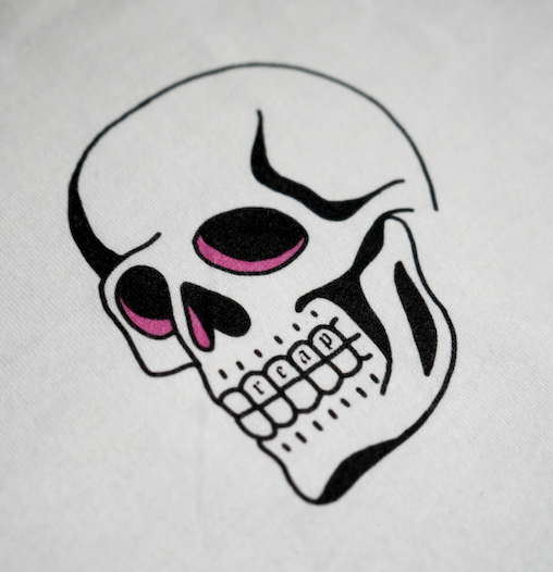 Skull design with pink eyes on a light gray background