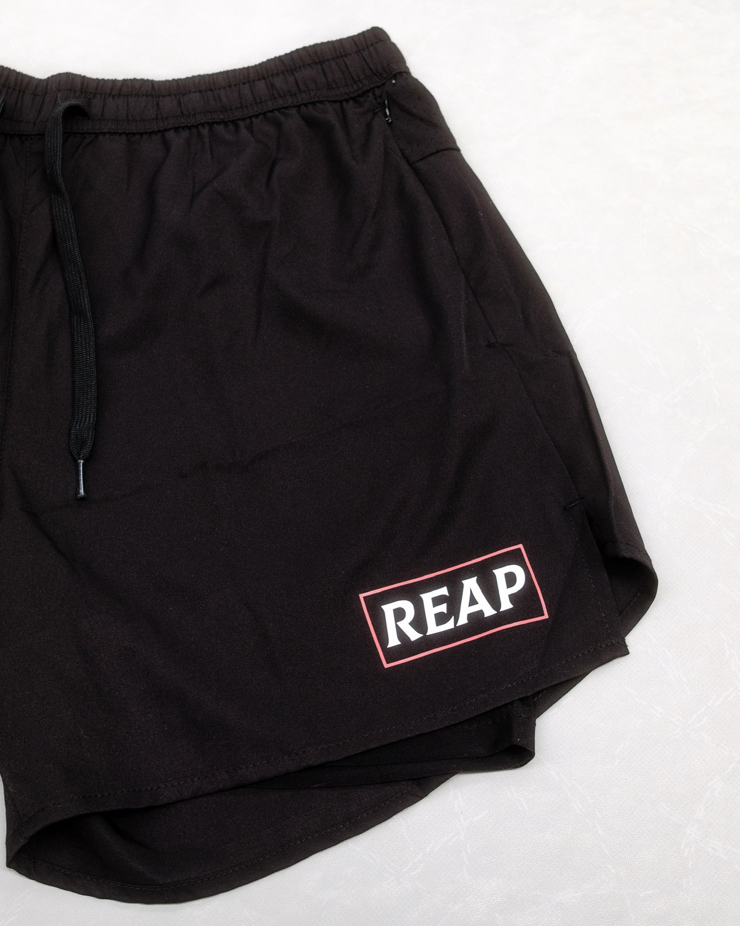 black reap gym shorts with zip pockets