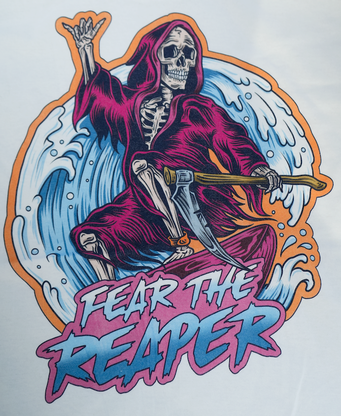 Stylized skeleton in a hooded cloak with 'Fear the Reaper' text on a white background