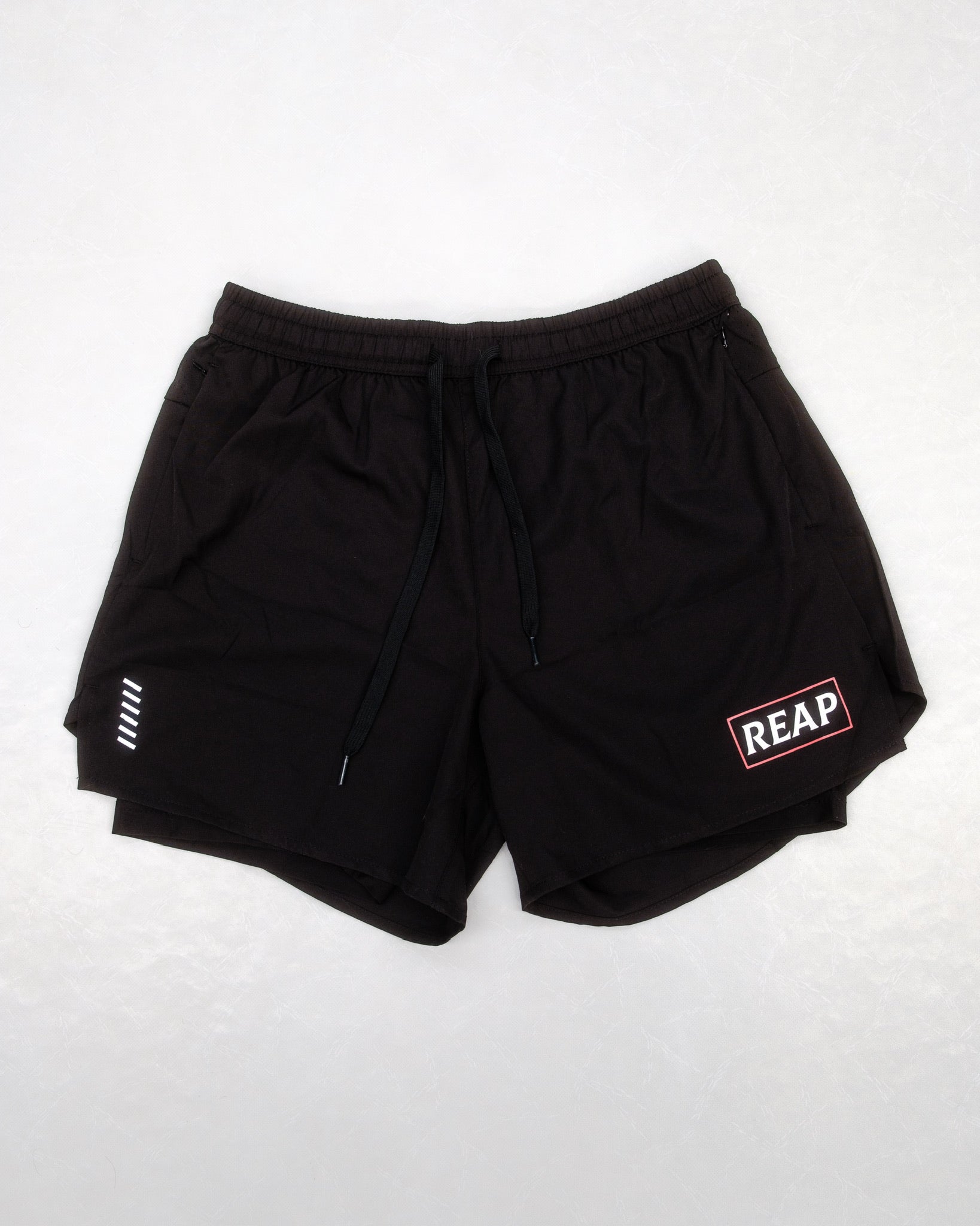 black reap gym shorts with zip pockets