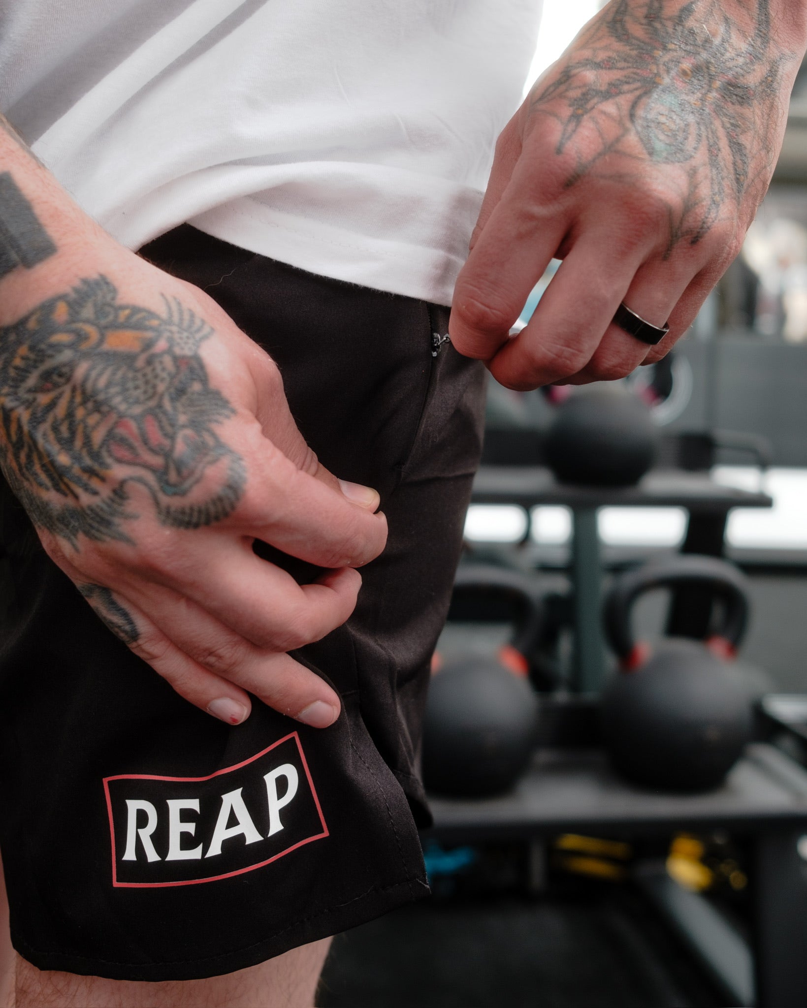 black reap gym shorts with zip pockets