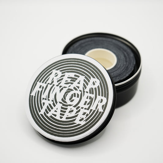 Black Finger Tape in a tin with the lid slightly off and the reap logo on top for Jiu Jitsu
